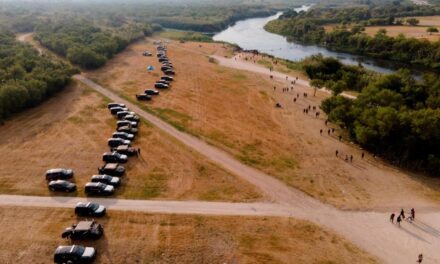Texas governor approves miles-long ‘steel barrier’ of vehicles to deter migrants