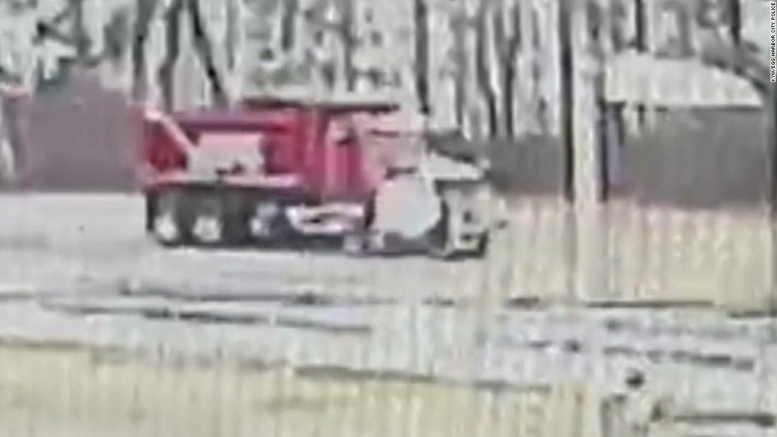 Video shows dump truck slam into home