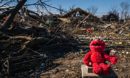 Searchers digging through mountains of debris left by deadly tornadoes in Kentucky